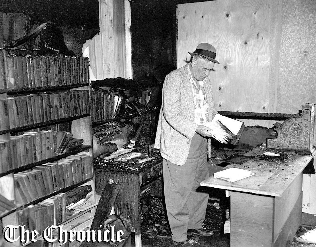 From the June 1959 Chronicle archives: “NO SALE NOW - Leighton Crandall, owner of the Crandall Bookstore, 103 1/2 South Tower Ave., Centralia, punches “no sale” button on his cash register after fire gutted the front portion of his store Tuesday evening. Most of the books in the place, including some rare first editions, were destroyed in the blaze. The cash register, located near the fire’s point of origin was buried beyond use and even the “no sale” failed to register. - Chronicle Staff Photo.”
